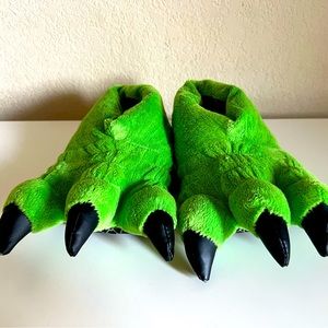 Green dinosaur soft slippers.